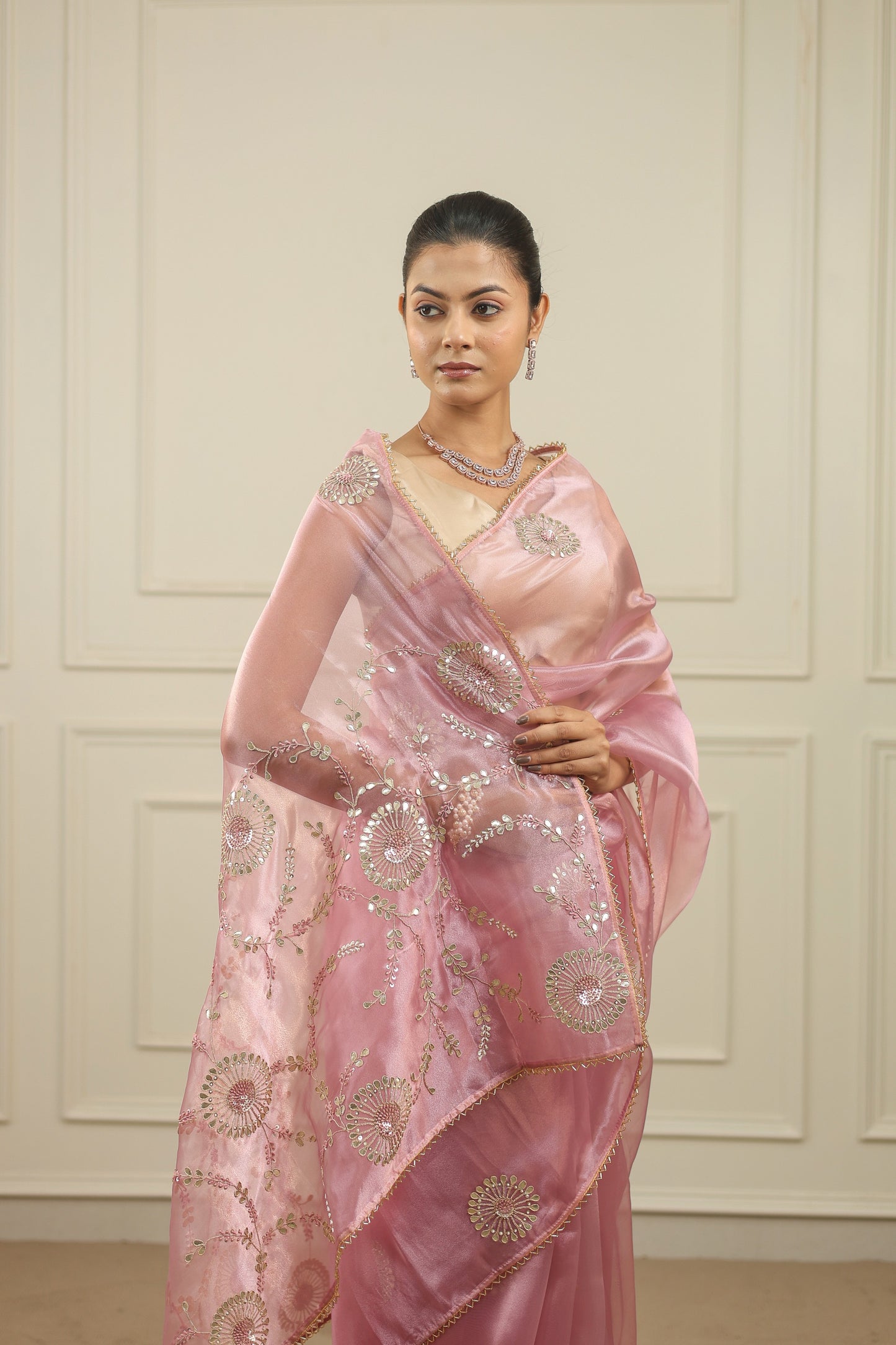Blush pink organza saree with gottapatti, sequins and thread work and motifs