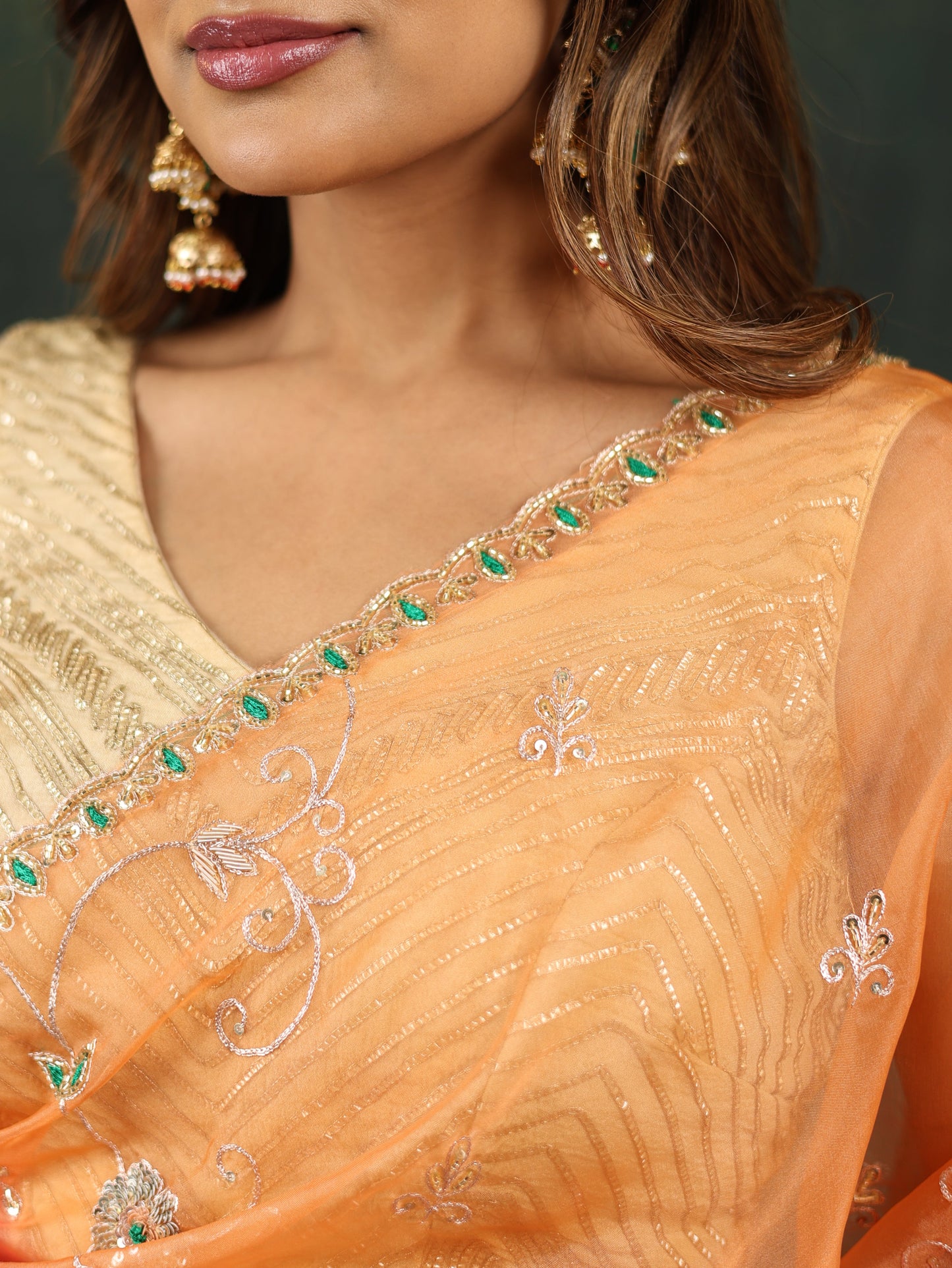 Shaded pink/red organza saree with sequins and zardosi threadwork