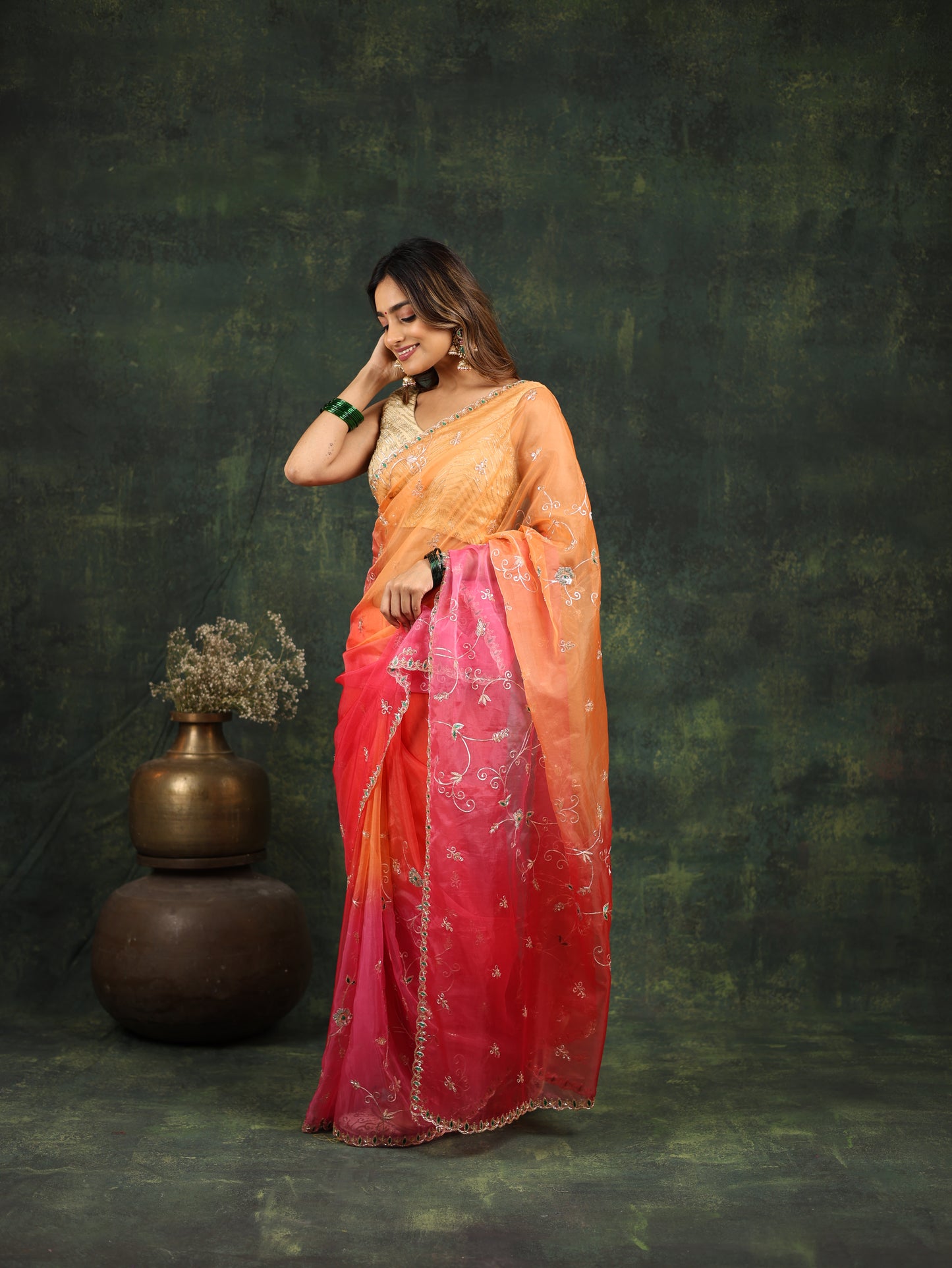 Shaded pink/red organza saree with sequins and zardosi threadwork