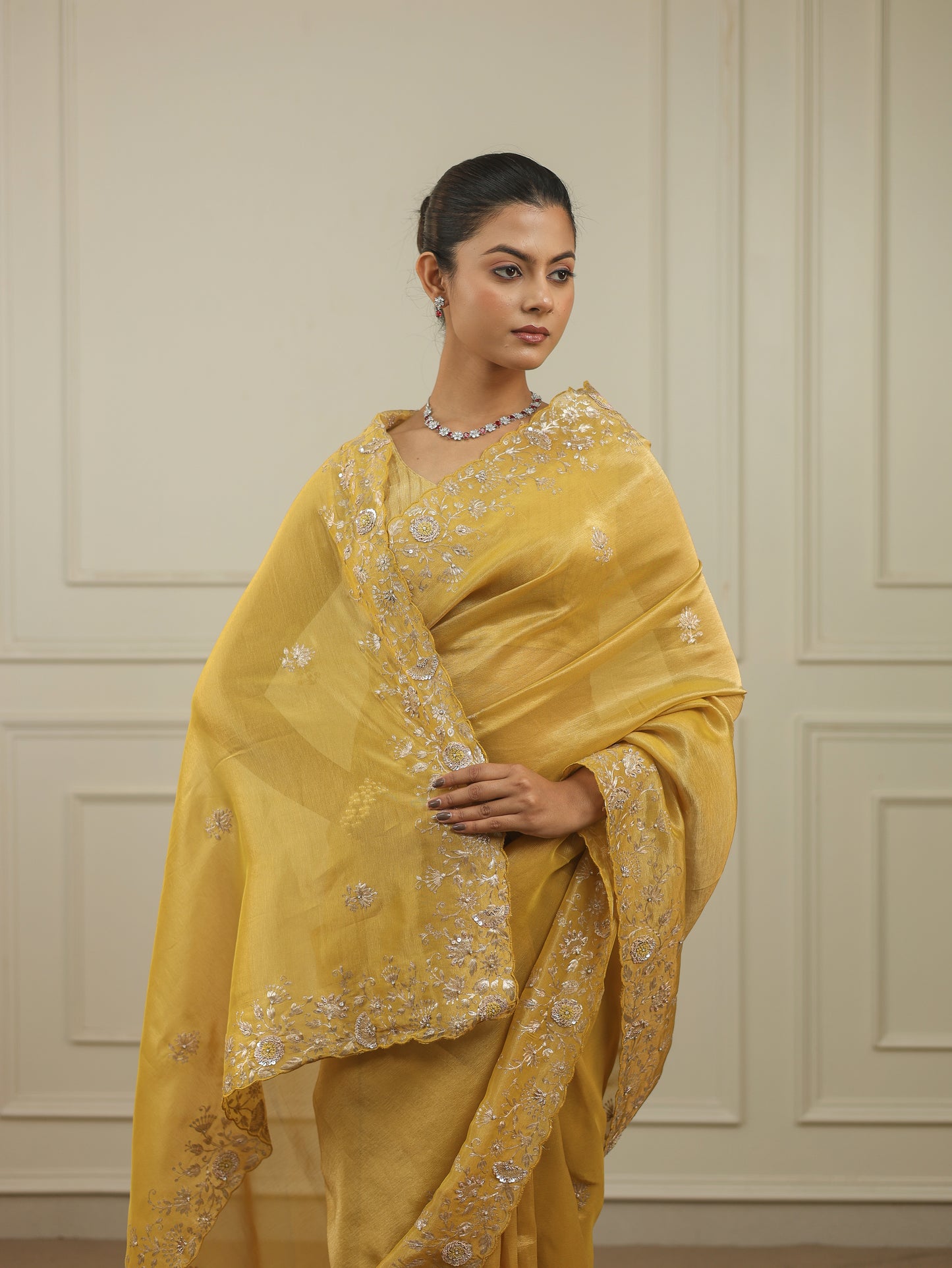Bright chrome yellow tissue saree with sequins and pittan threadwork