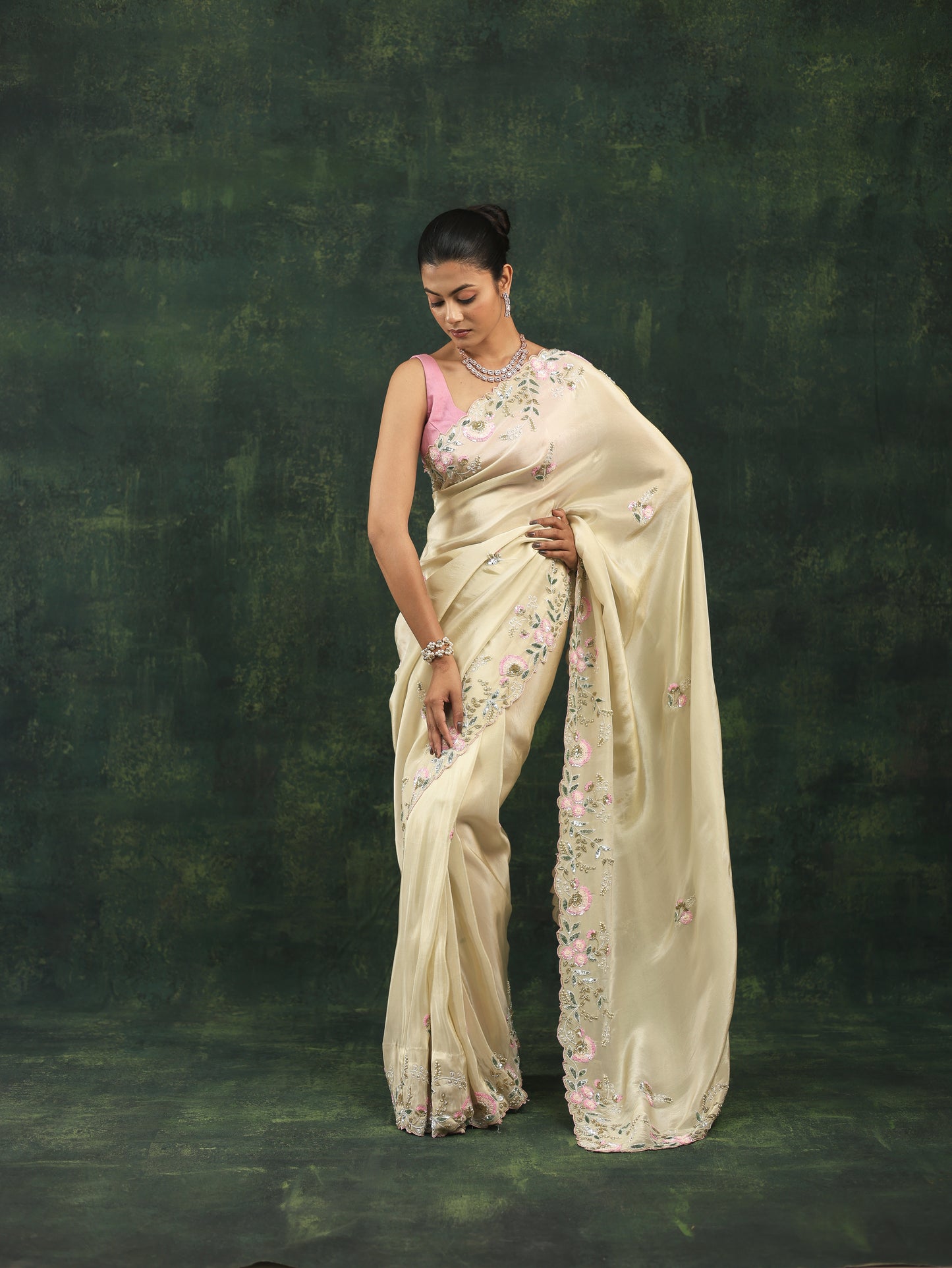 Soft cream satin saree with pink sequins and threadwork