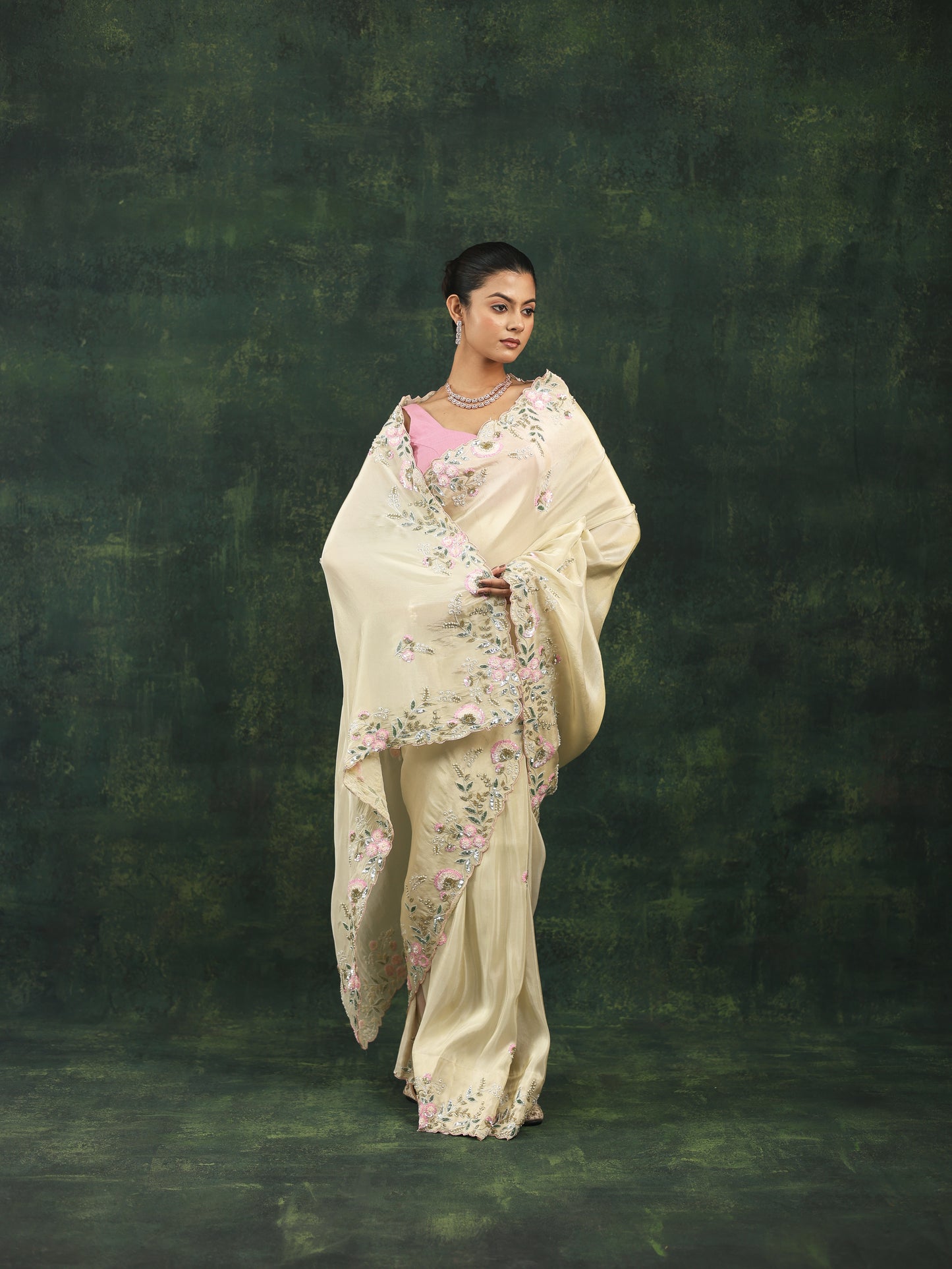 Soft cream satin saree with pink sequins and threadwork