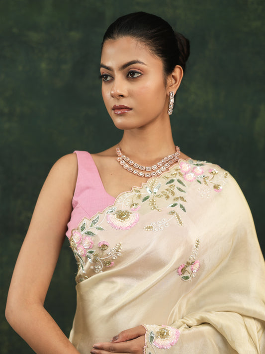Soft cream satin saree with pink sequins and threadwork