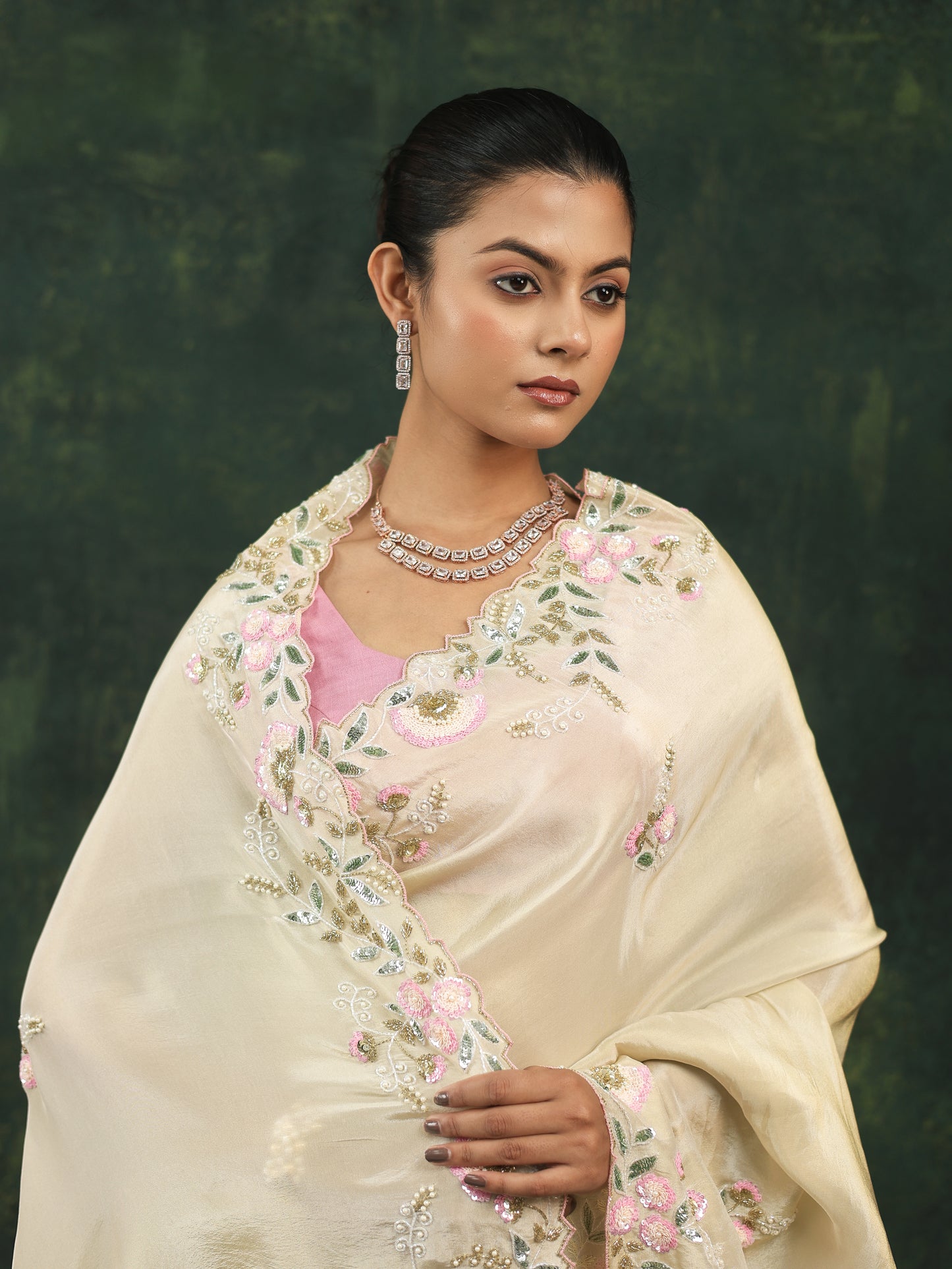 Soft cream satin saree with pink sequins and threadwork