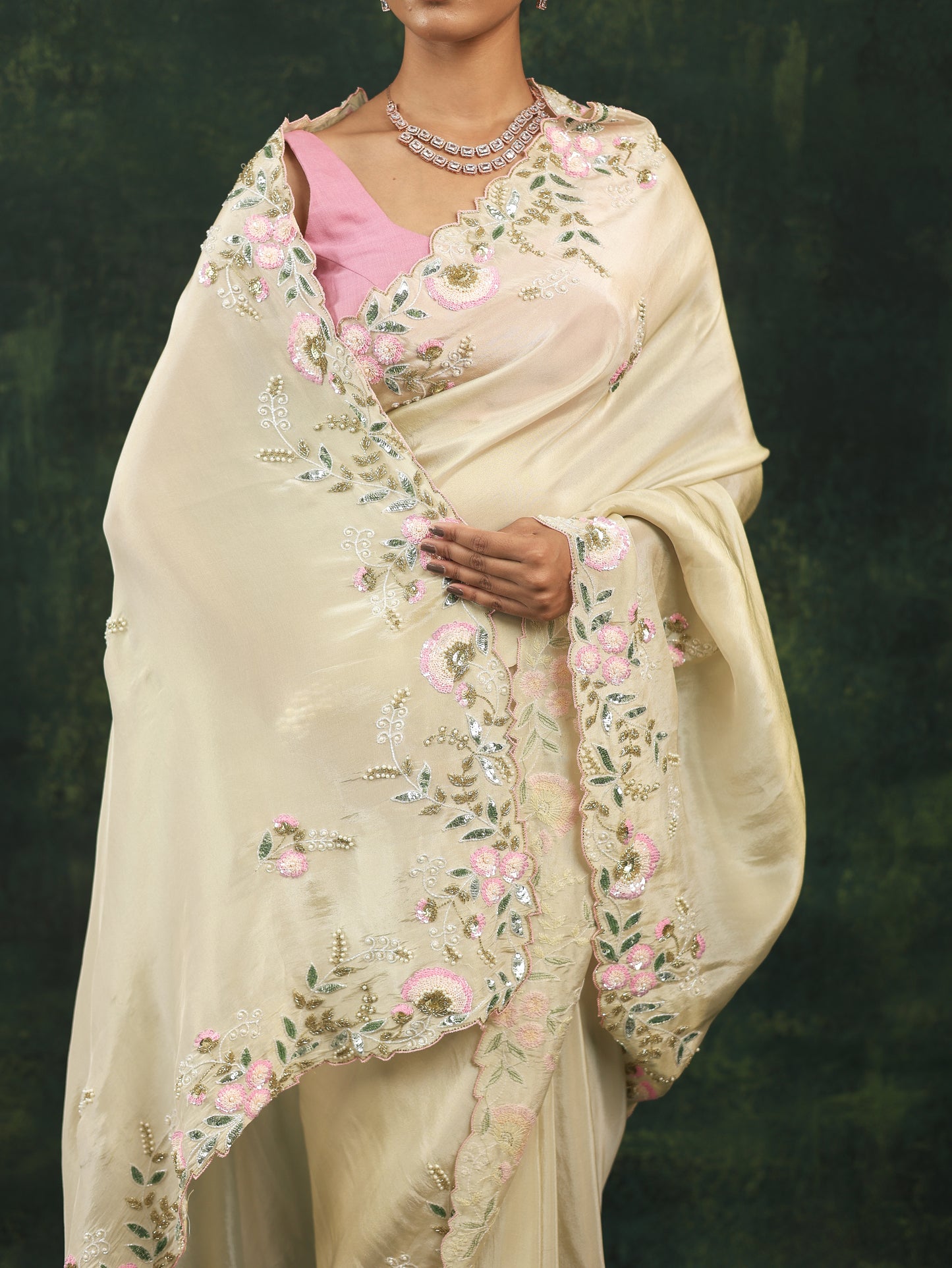 Soft cream satin saree with pink sequins and threadwork