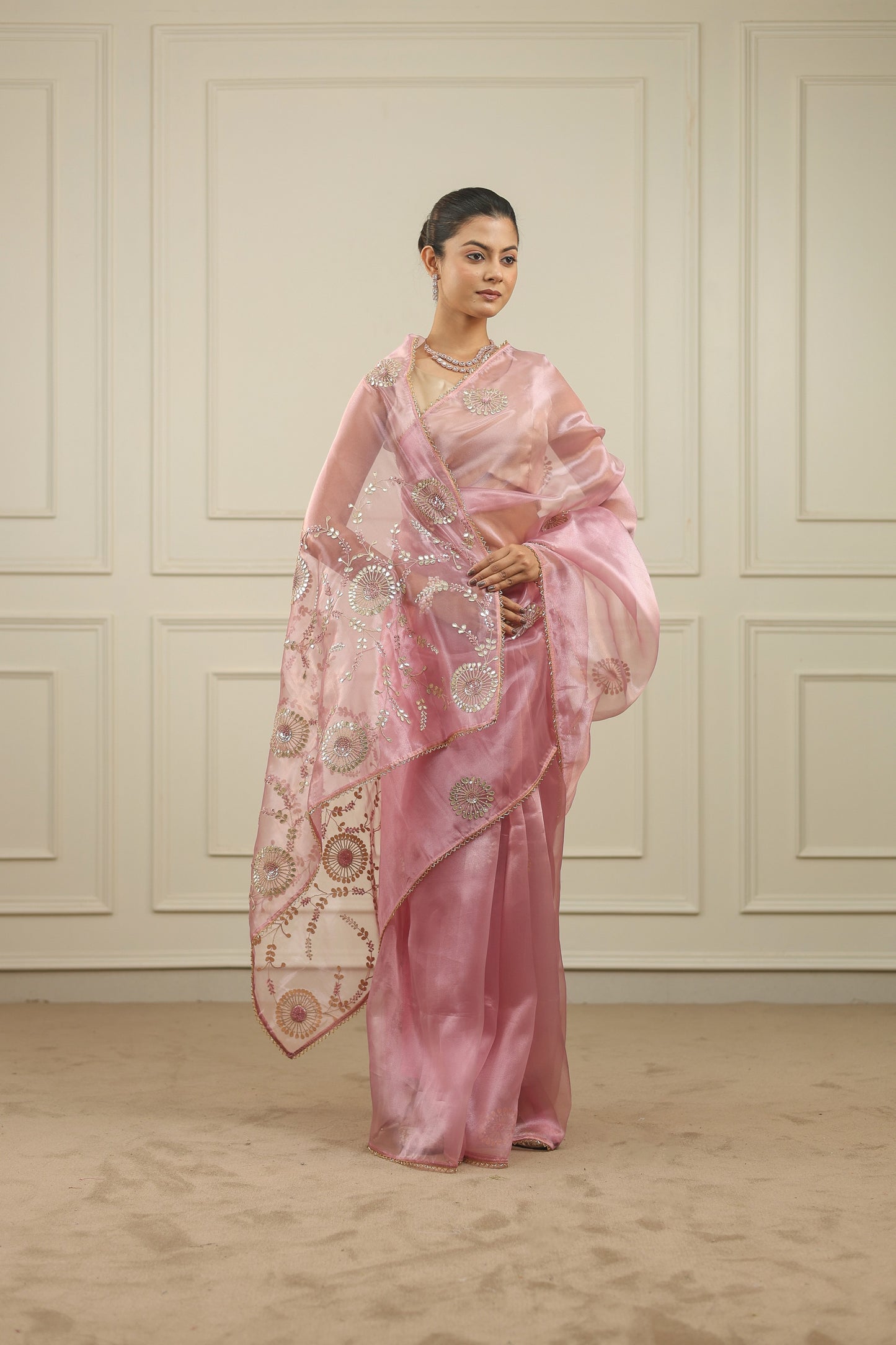 Blush pink organza saree with gottapatti, sequins and thread work and motifs