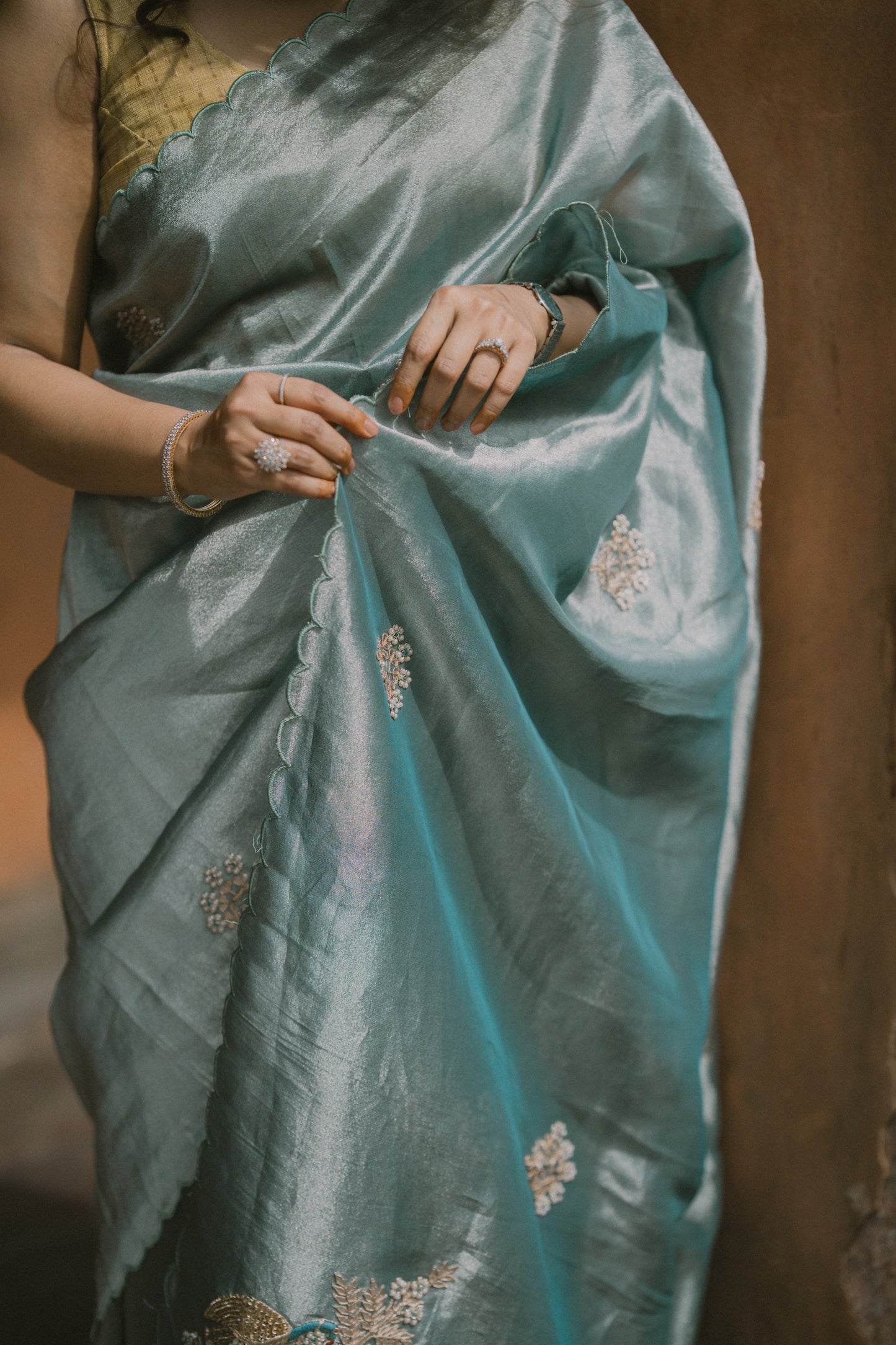 Ocean blue saree with zardosi and sequins threadwork and floral motifs