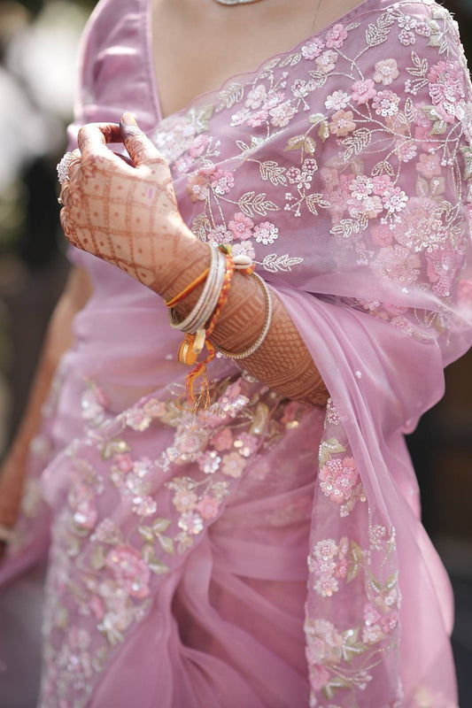 Beautiful blush pink organza saree with sequins and threadwork