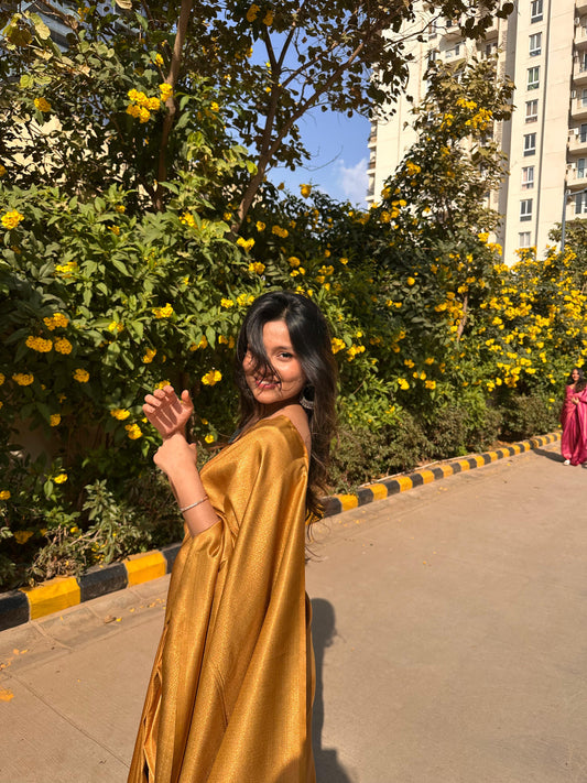 Bright golden saree with golden thread self work