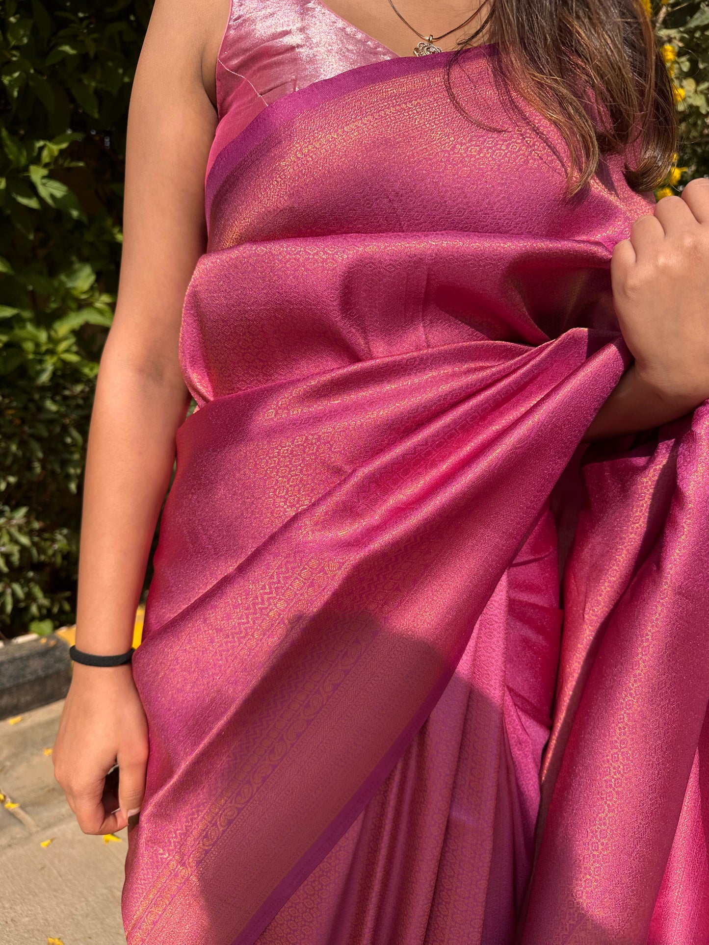 Bright dark pink saree with golden thread self work