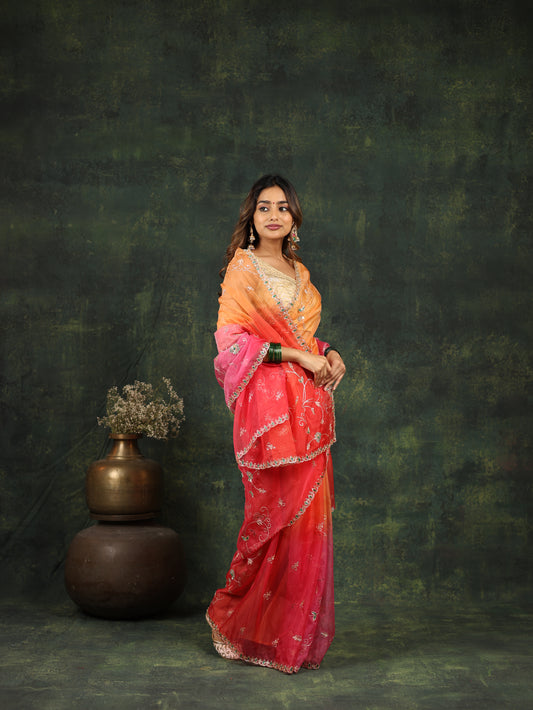 Shaded pink/red organza saree with sequins and zardosi threadwork