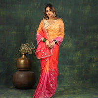 Shaded pink/red organza saree with sequins and zardosi threadwork