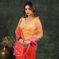 Shaded pink/red organza saree with sequins and zardosi threadwork
