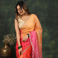 Shaded pink/red organza saree with sequins and zardosi threadwork