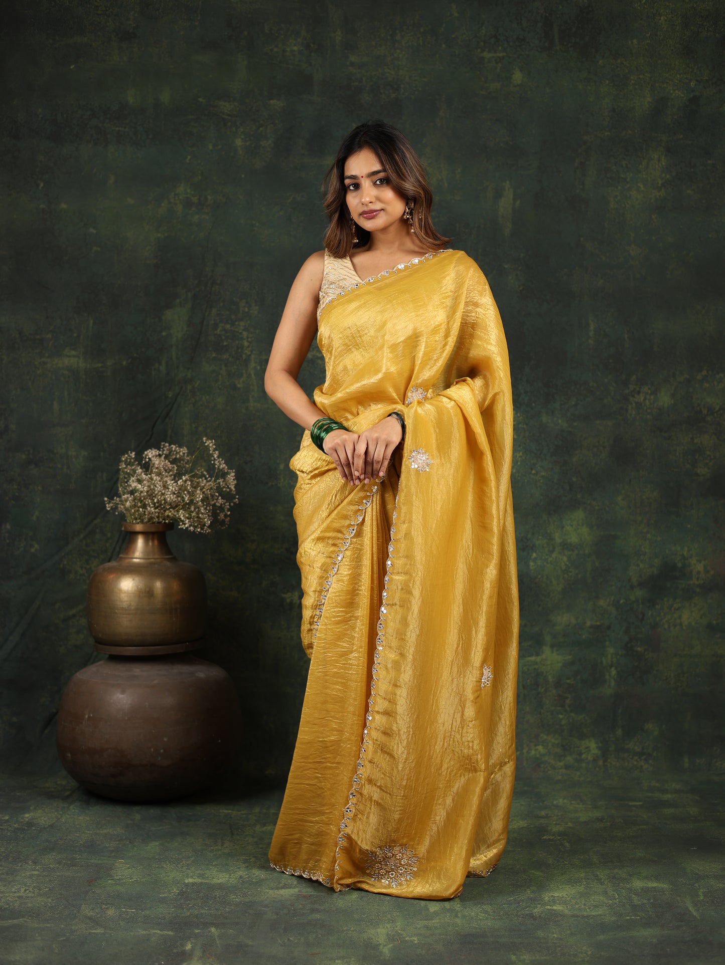 Yellow saree with Sequins and threadwork along with matching blouse