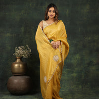 Yellow saree with Sequins and threadwork along with matching blouse