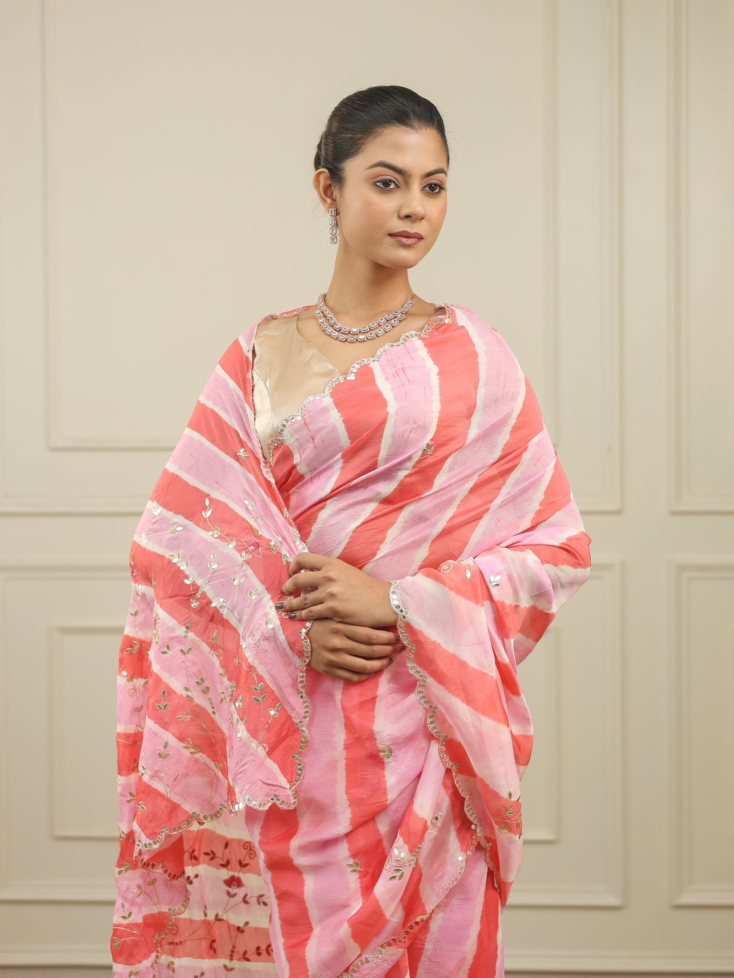 Light tangerine and pink leheriya saree with gottapatti work