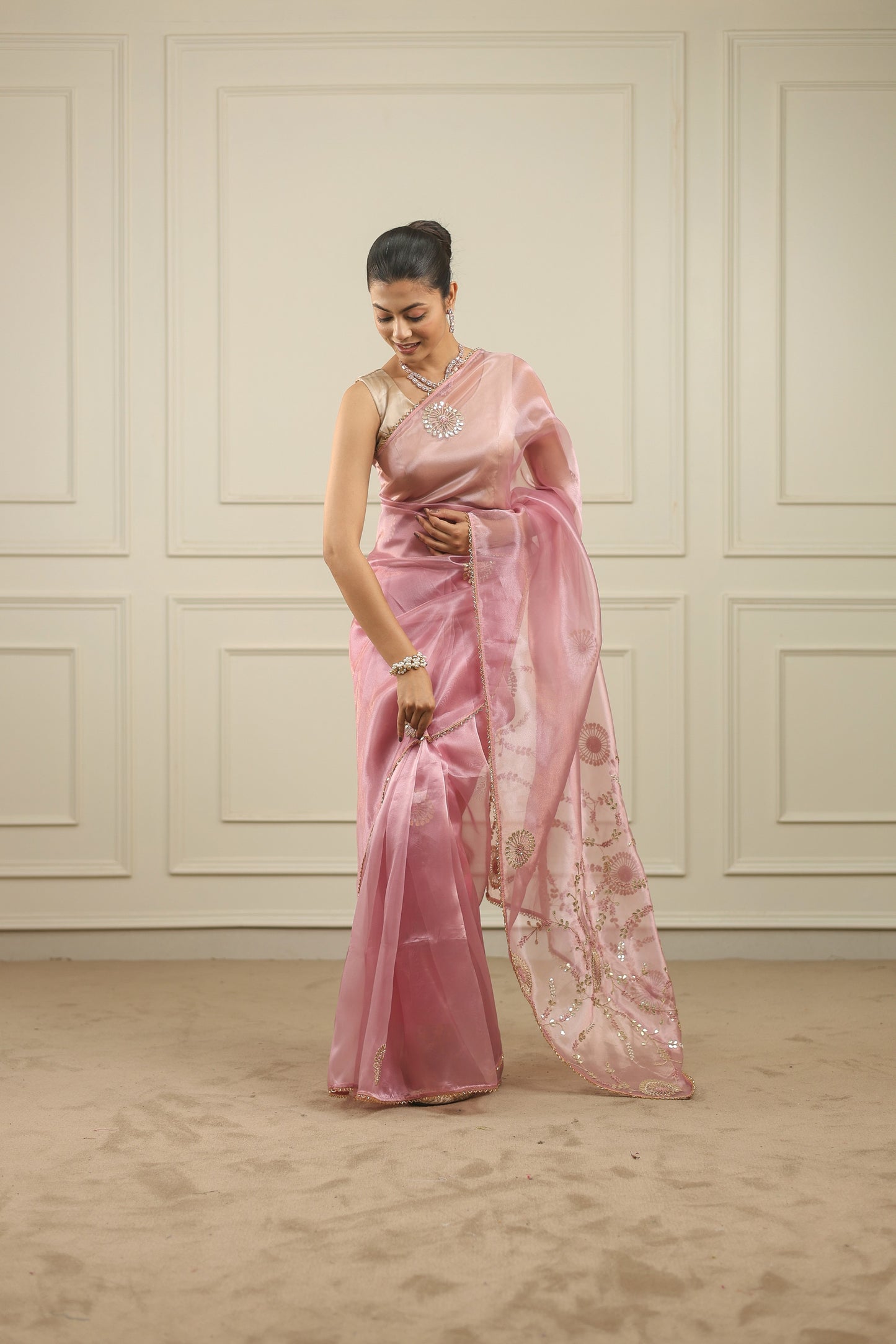 Blush pink organza saree with gottapatti, sequins and thread work and motifs