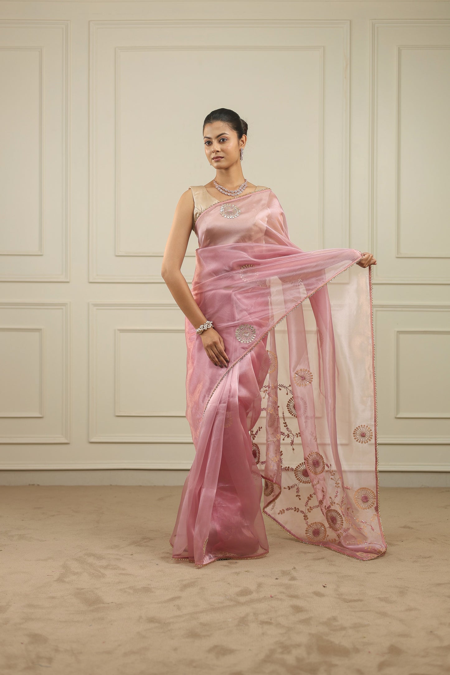 Blush pink organza saree with gottapatti, sequins and thread work and motifs