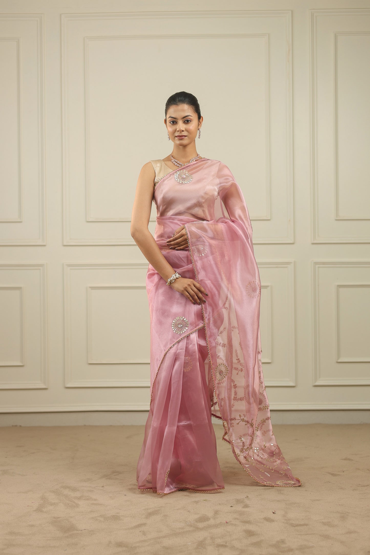 Blush pink organza saree with gottapatti, sequins and thread work and motifs