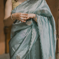 Ocean blue saree with zardosi and sequins threadwork and floral motifs