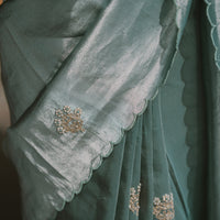 Ocean blue saree with zardosi and sequins threadwork and floral motifs