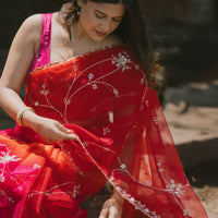 Beautiful shaded pink/red organza saree with sequins and zardosi threadwork