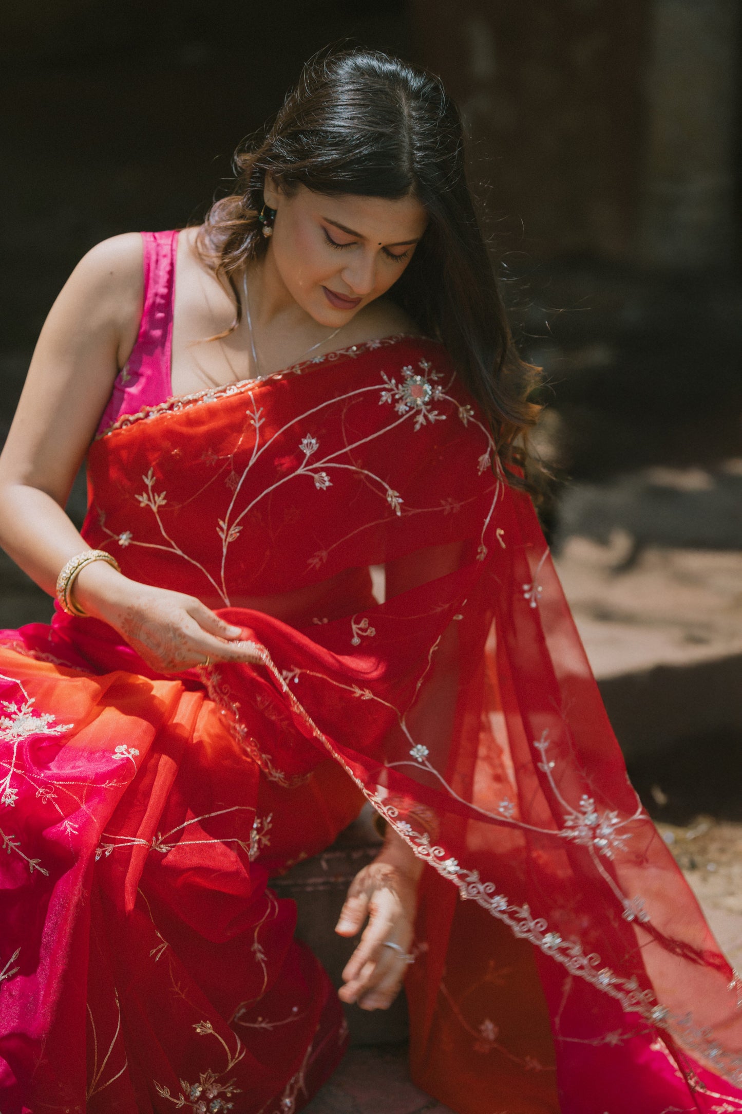 Beautiful shaded pink/red organza saree with sequins and zardosi threadwork