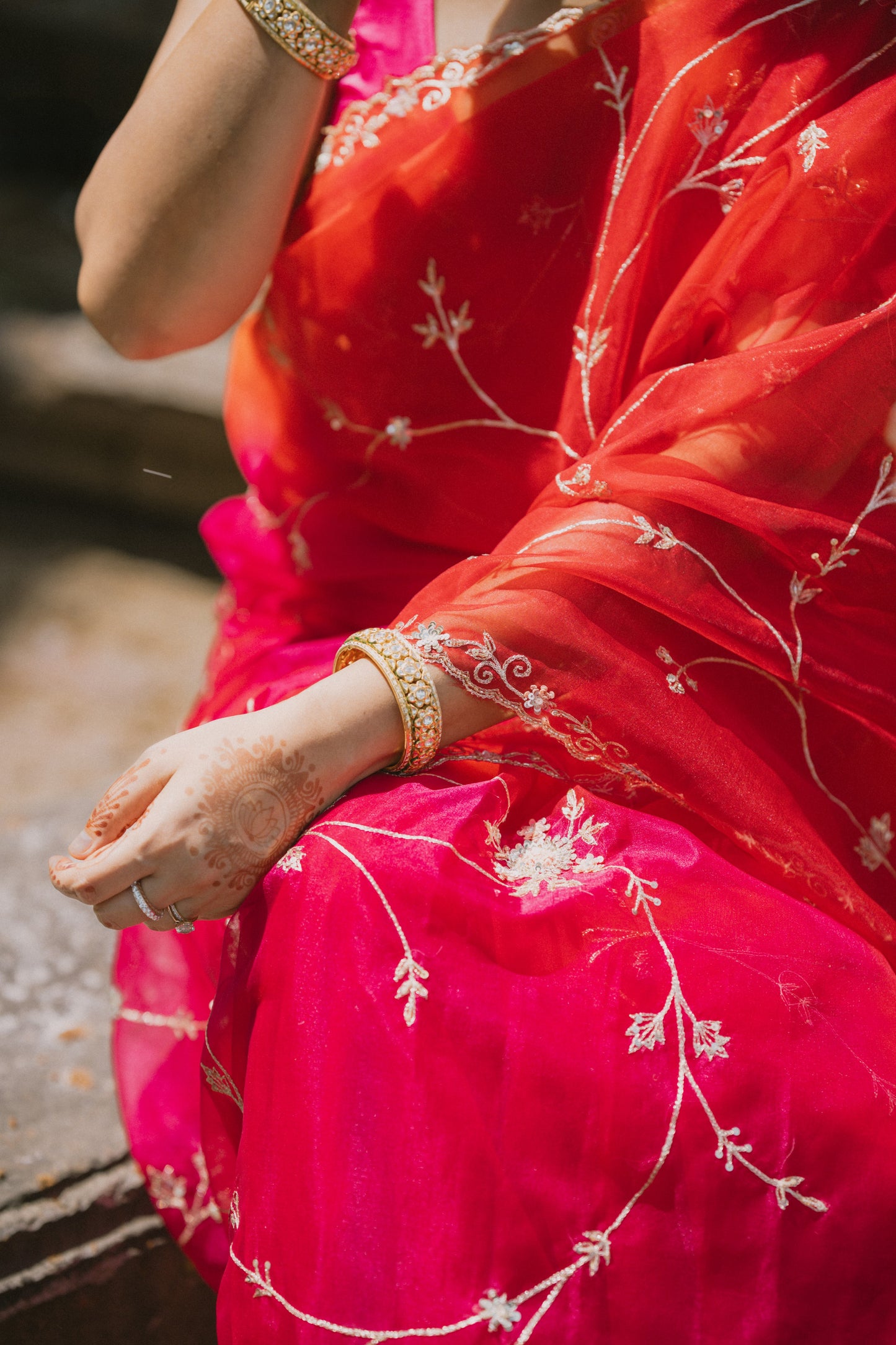 Beautiful shaded pink/red organza saree with sequins and zardosi threadwork