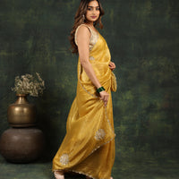 Yellow saree with Sequins and threadwork along with matching blouse