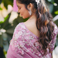Beautiful blush pink organza saree with sequins and threadwork
