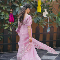 Beautiful blush pink organza saree with sequins and threadwork