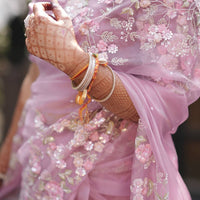 Beautiful blush pink organza saree with sequins and threadwork