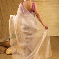 Organza golden saree with sequins work and matching blouse