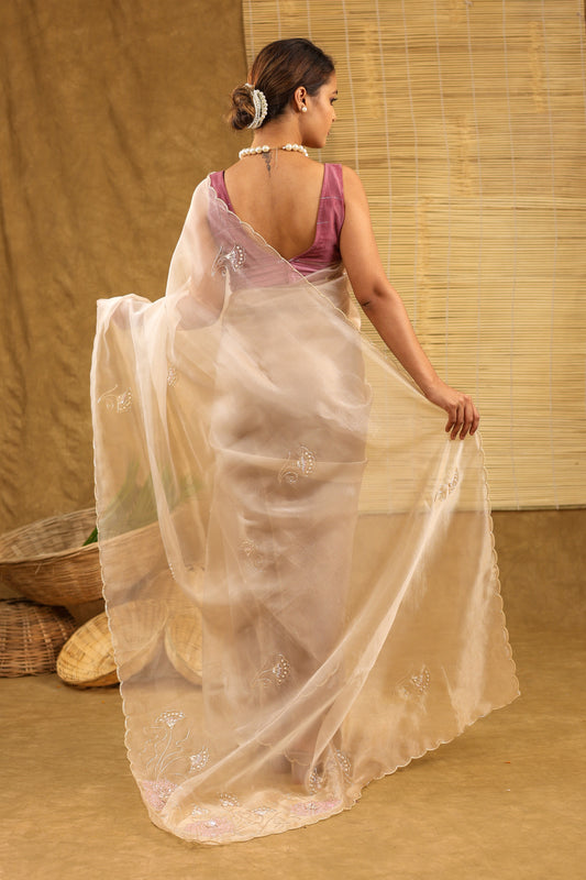 Organza golden saree with sequins work and matching blouse
