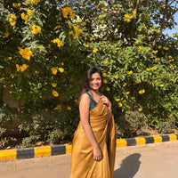 Bright golden saree with golden thread self work