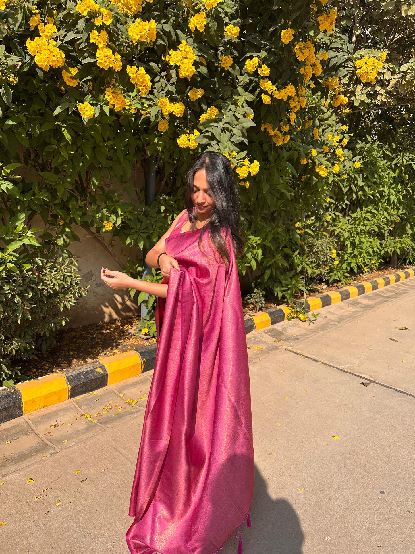Bright dark pink saree with golden thread self work