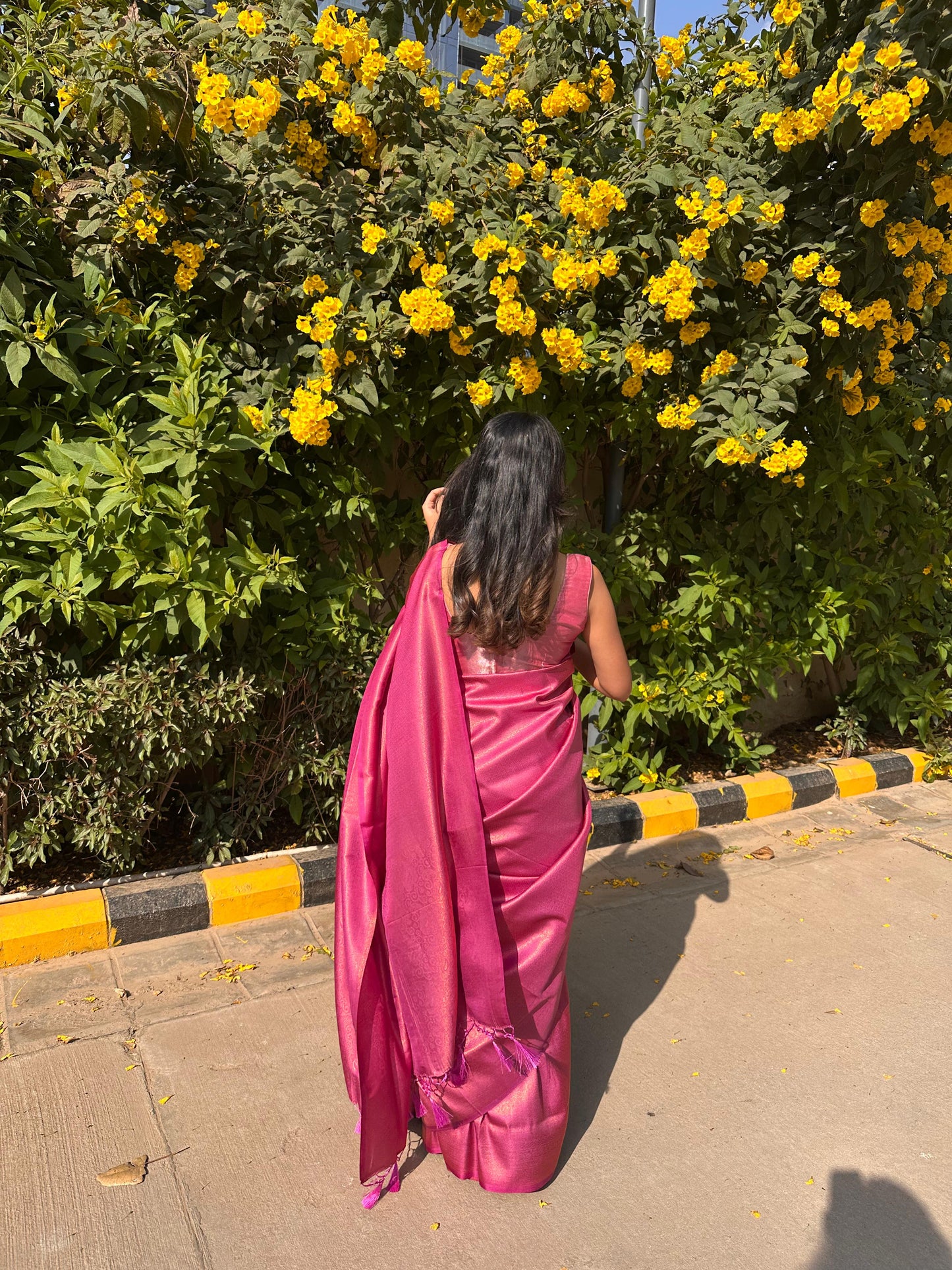Bright dark pink saree with golden thread self work