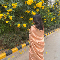 Bright cream saree with golden thread self work