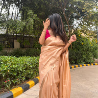 Bright cream saree with golden thread self work