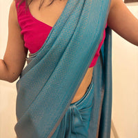 Turquoise blue saree with golden thread self work